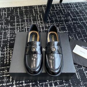CHANEL Shiny Black Men's Slip-On Loafers
